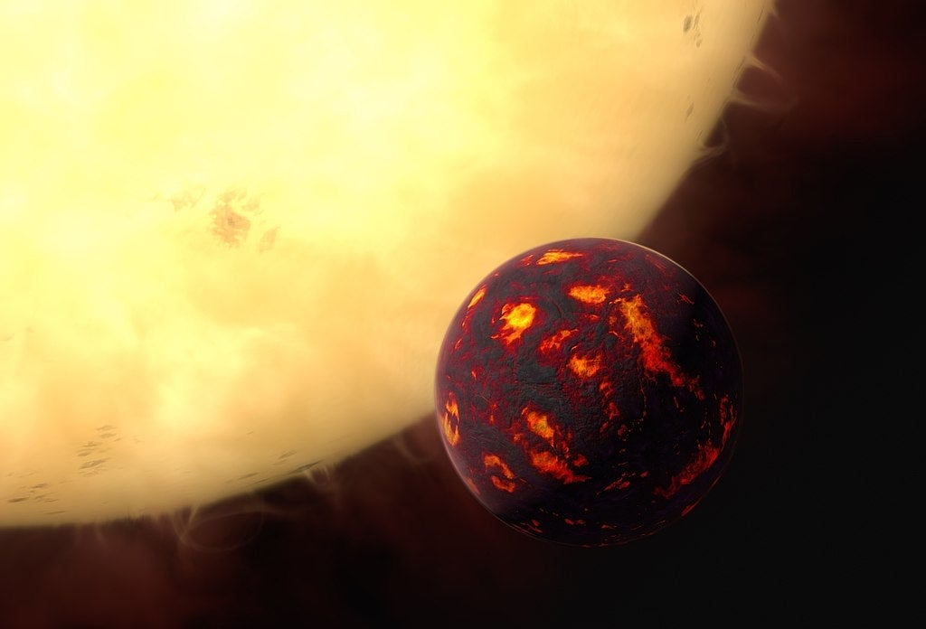 Impresión artística de la Supertierra 55 Cancri e frente a su estrella