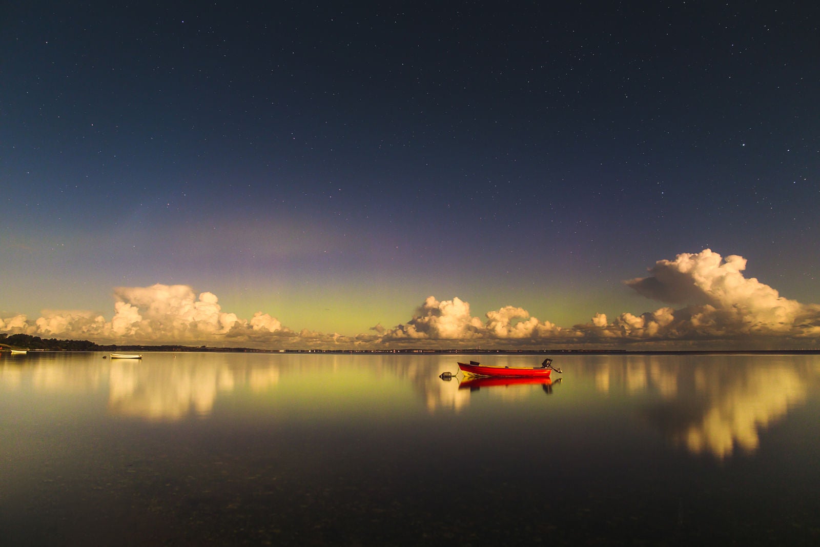 “The Return of Green Lady:” Una de las más comentadas en la categoría de “Auroras Boreales”, tomada en Limfjord, Dinamarca Imagen: Ruslan Merzlyakov, Latvia