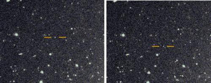 Dos de las nuevas lunas de Saturno (entre las rayas amarillas)