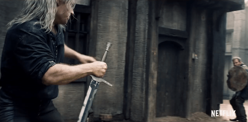 Geralt lanzando la señar ‘Aard’ sobre unos enemigos.