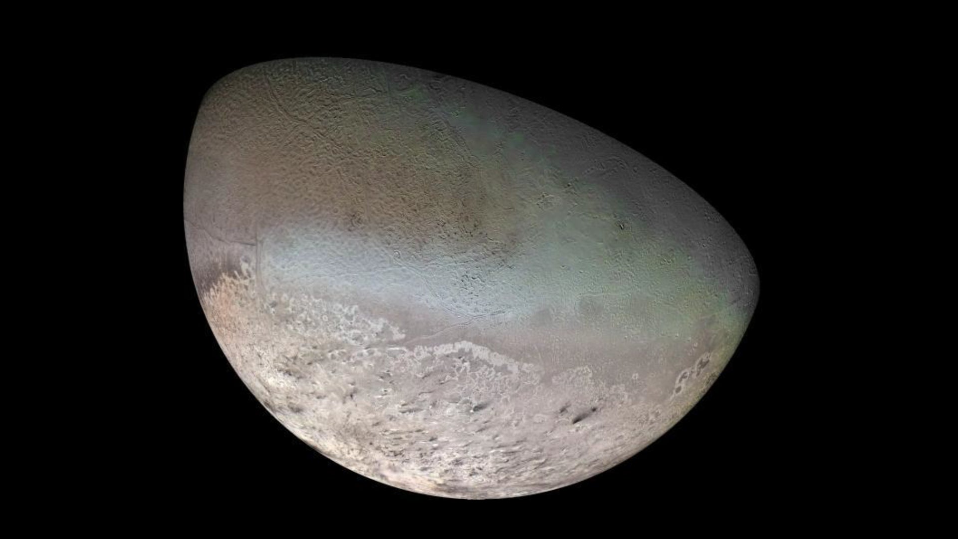 Imagen de Triton, la luna de Titan, capturada por la sonda Voyager 2 
Imagen: NASA/JPL/USGS