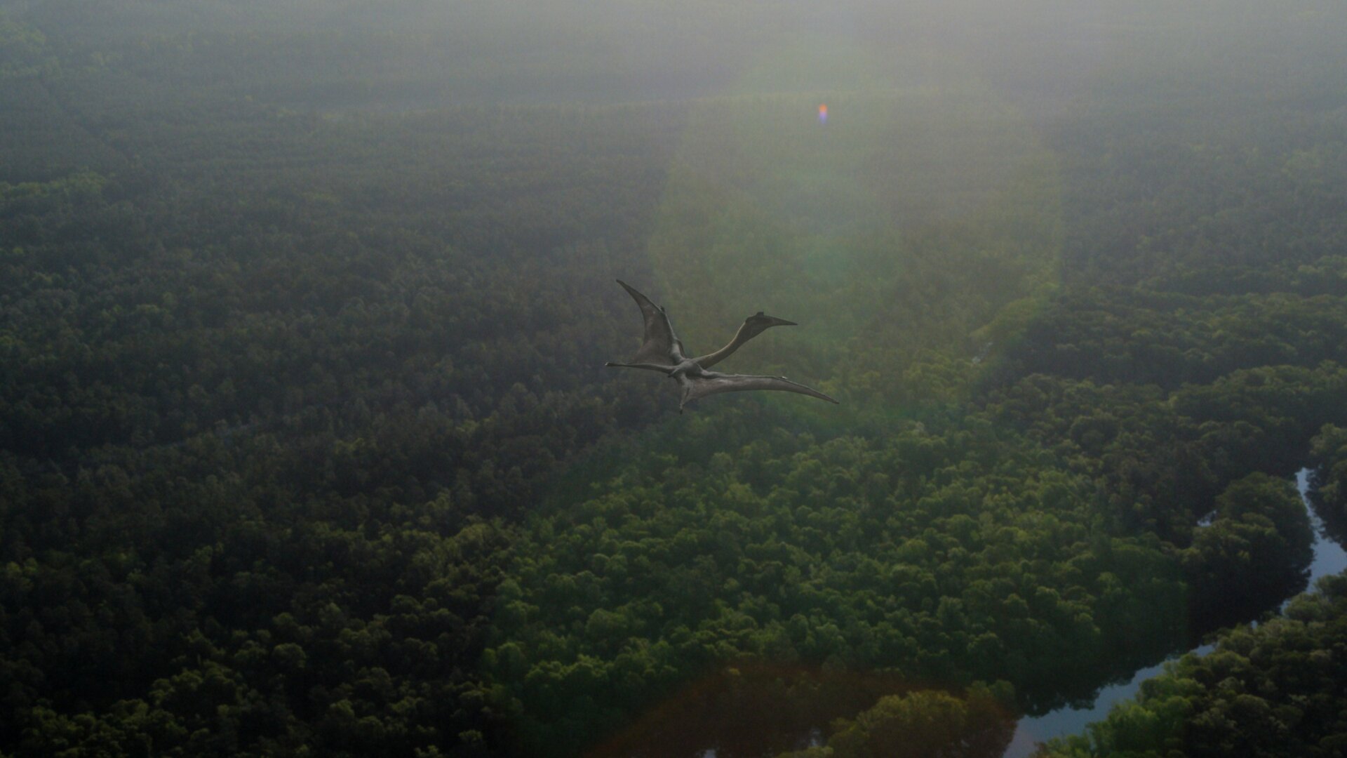 Quetzalcoatlus, el pterosaurio más grande conocido, vuela sobre un bosque.