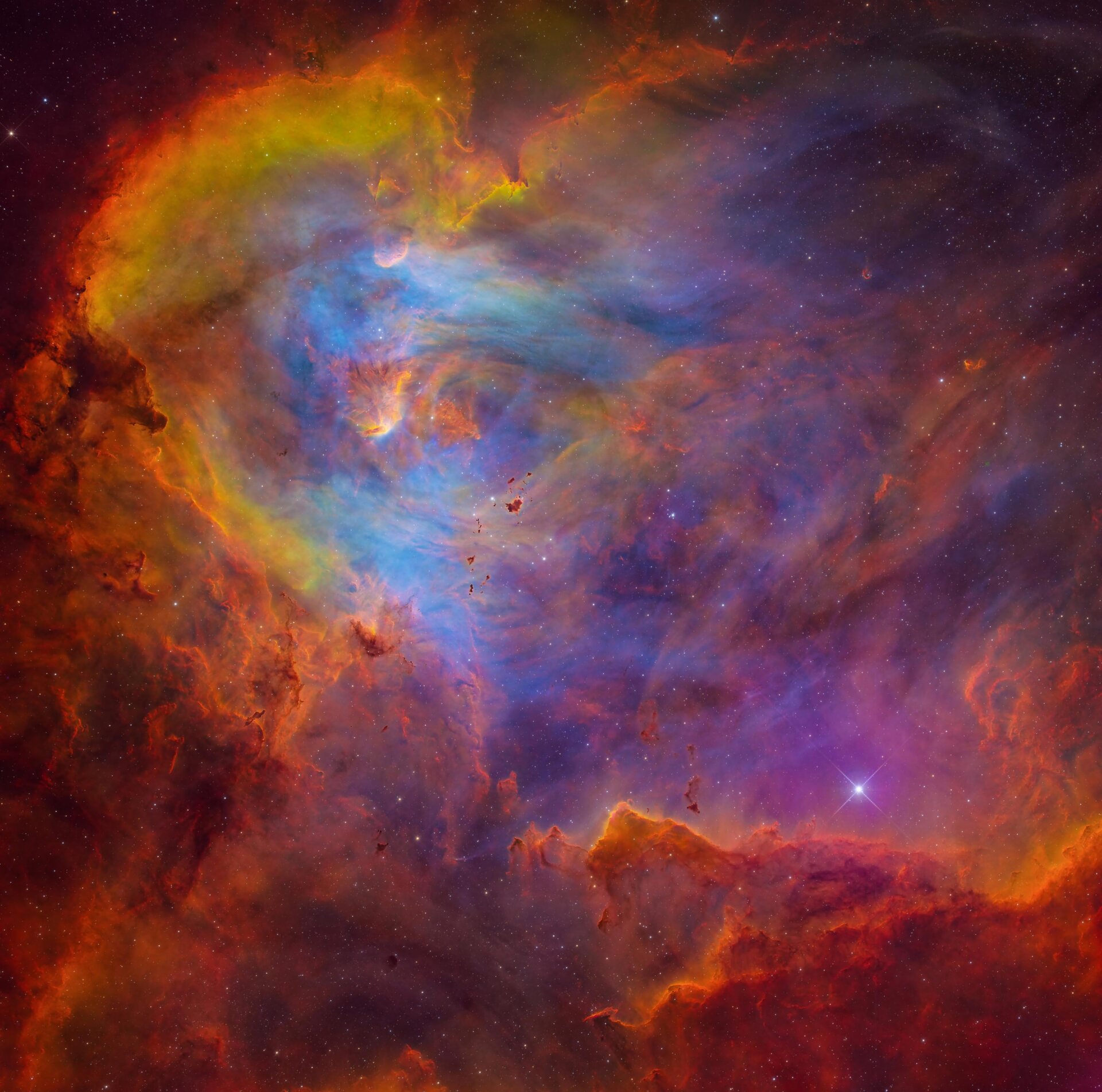 La Nebulosa del Pollo Corredor, rica en color y salpicada de estrellas.
