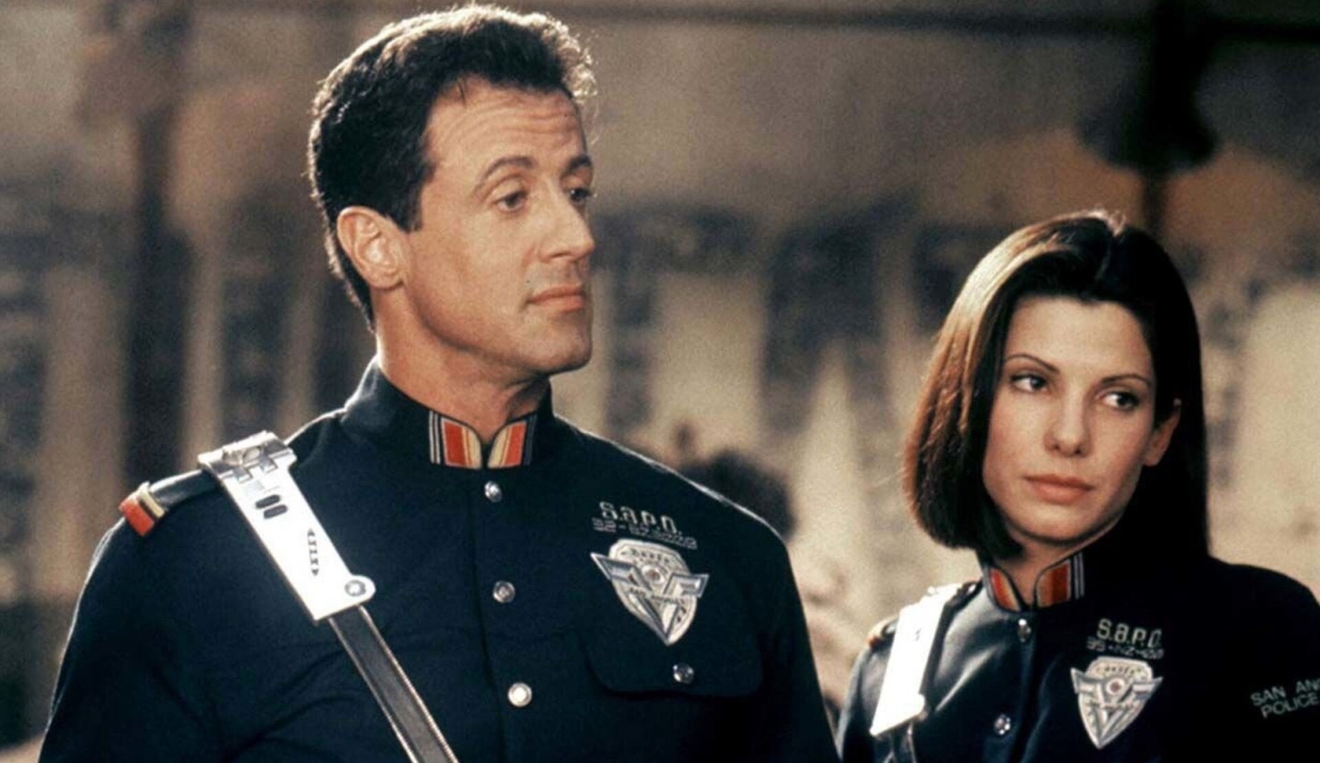 Sylvester Stallone y Sandra Bullock en hombre de demolición.
