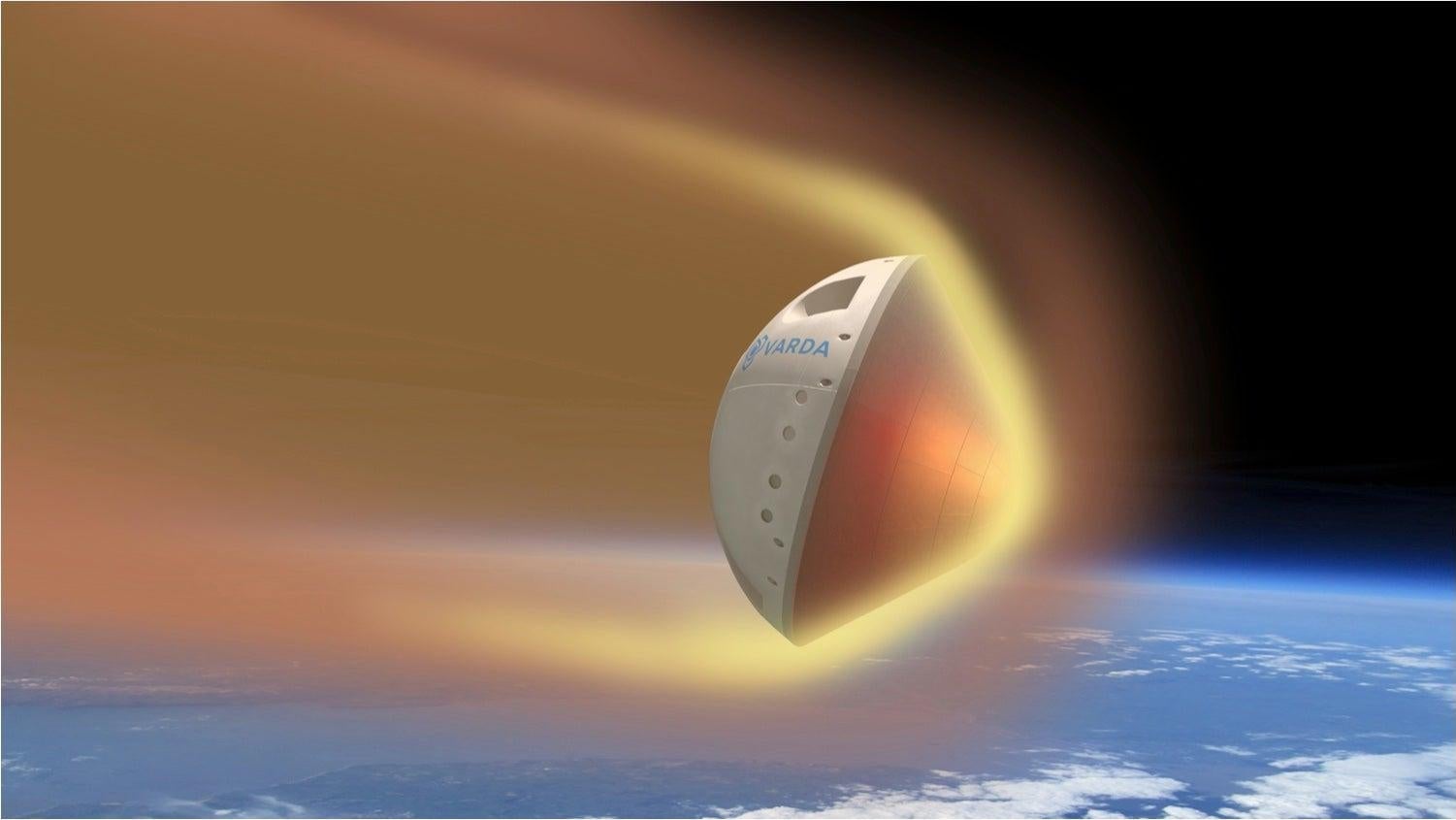 Una ilustración de la nave espacial W-Serie 1 reentrando en la atmósfera de la Tierra.