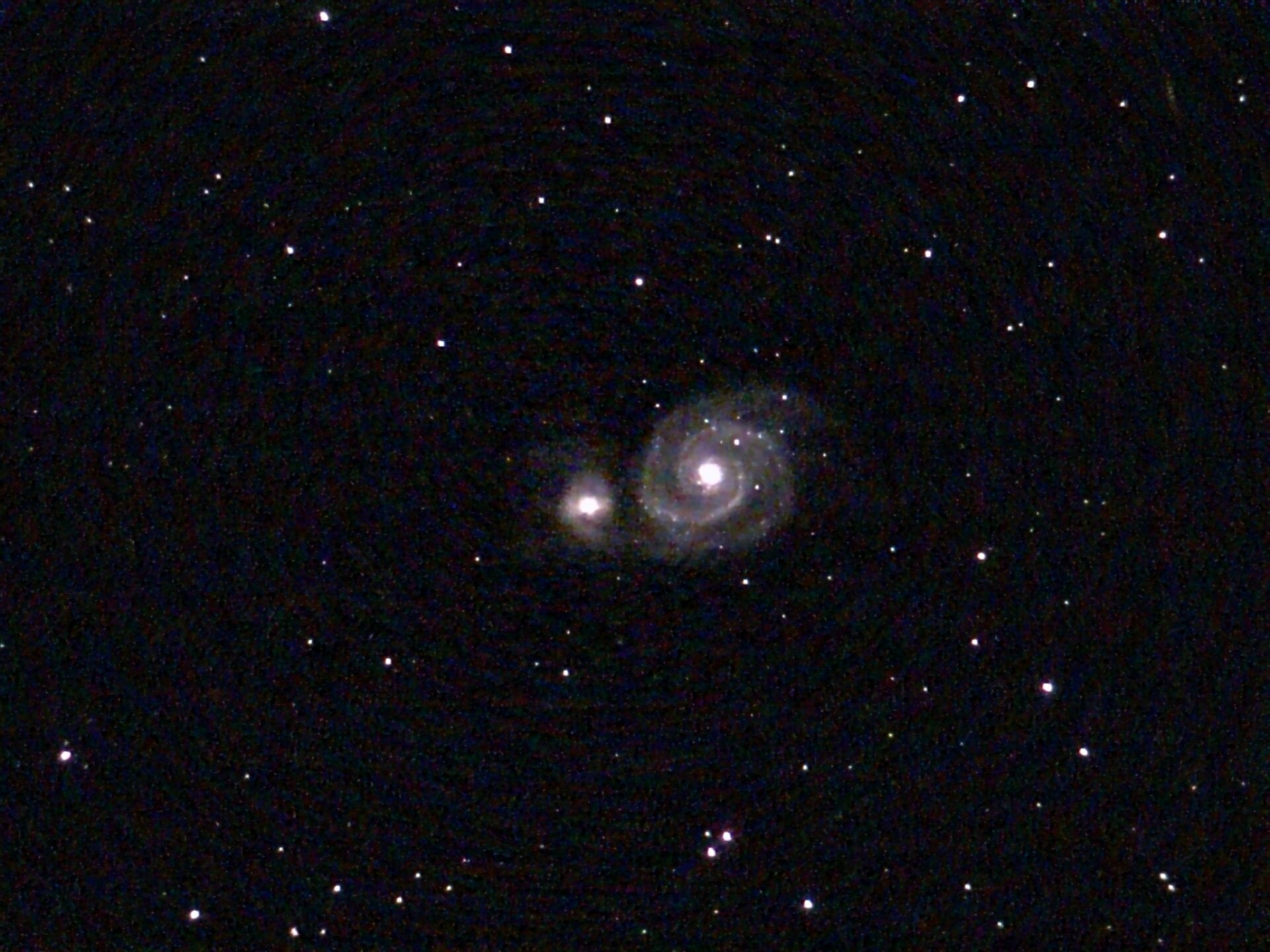 La galaxia Whirlpool, fotografiada por Odyssey Pro de Unistellar (sin edición externa). 