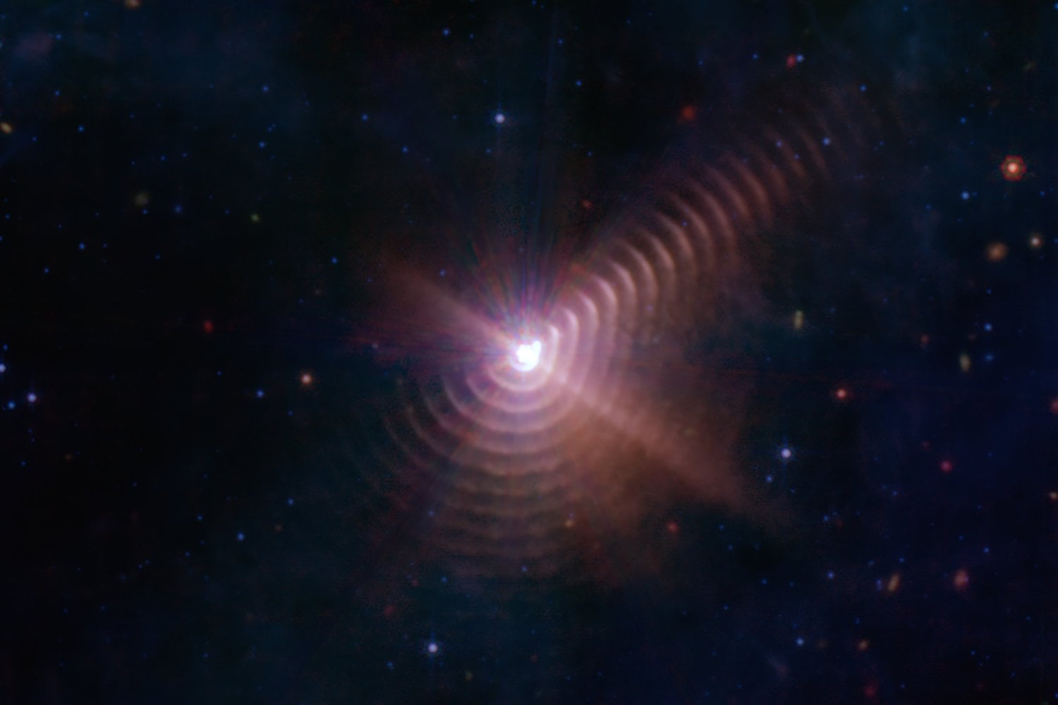 Una imagen del James Webb revela ondas de polvo estelar de dimensiones inimaginables