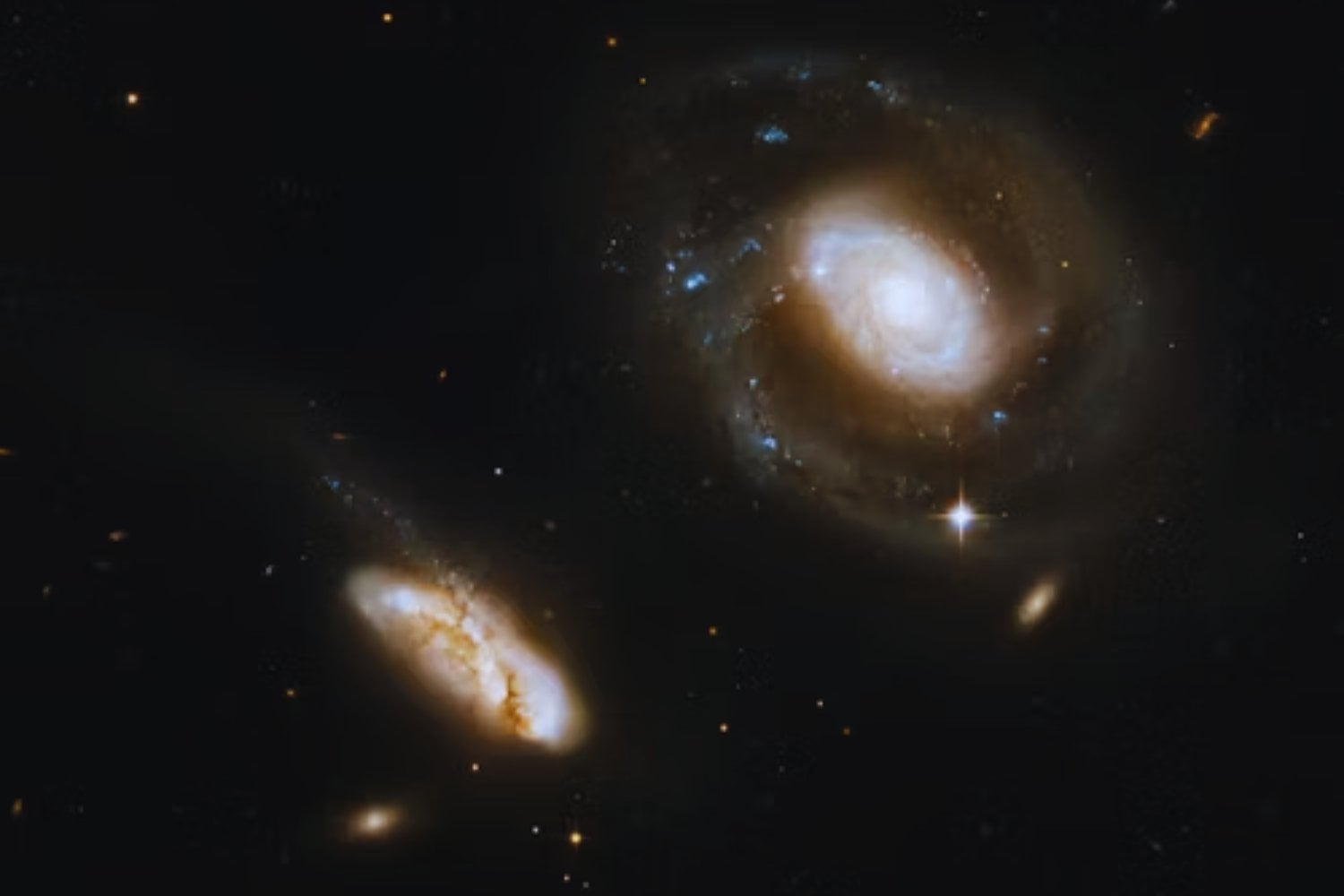 Choque entre gigantes: captan por primera vez una brutal batalla de galaxias en el universo profundo