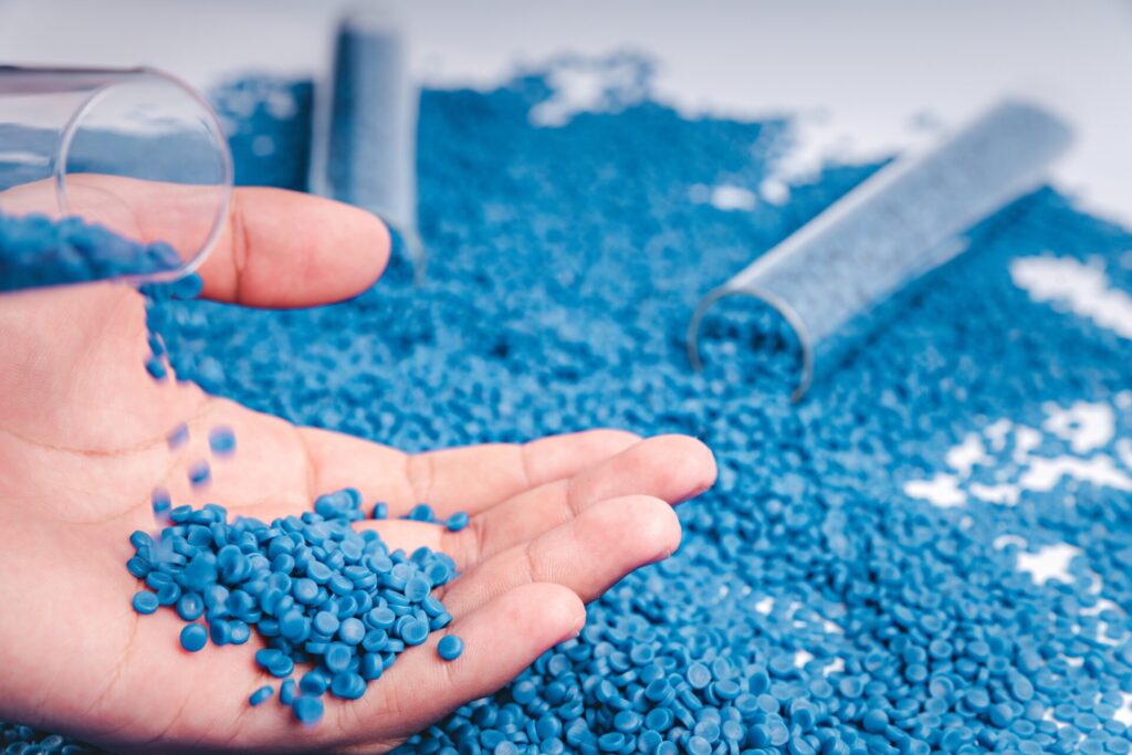 Blue,plastic,grain,,plastic,polymer,granules,hand,hold,polymer,pellets,,raw