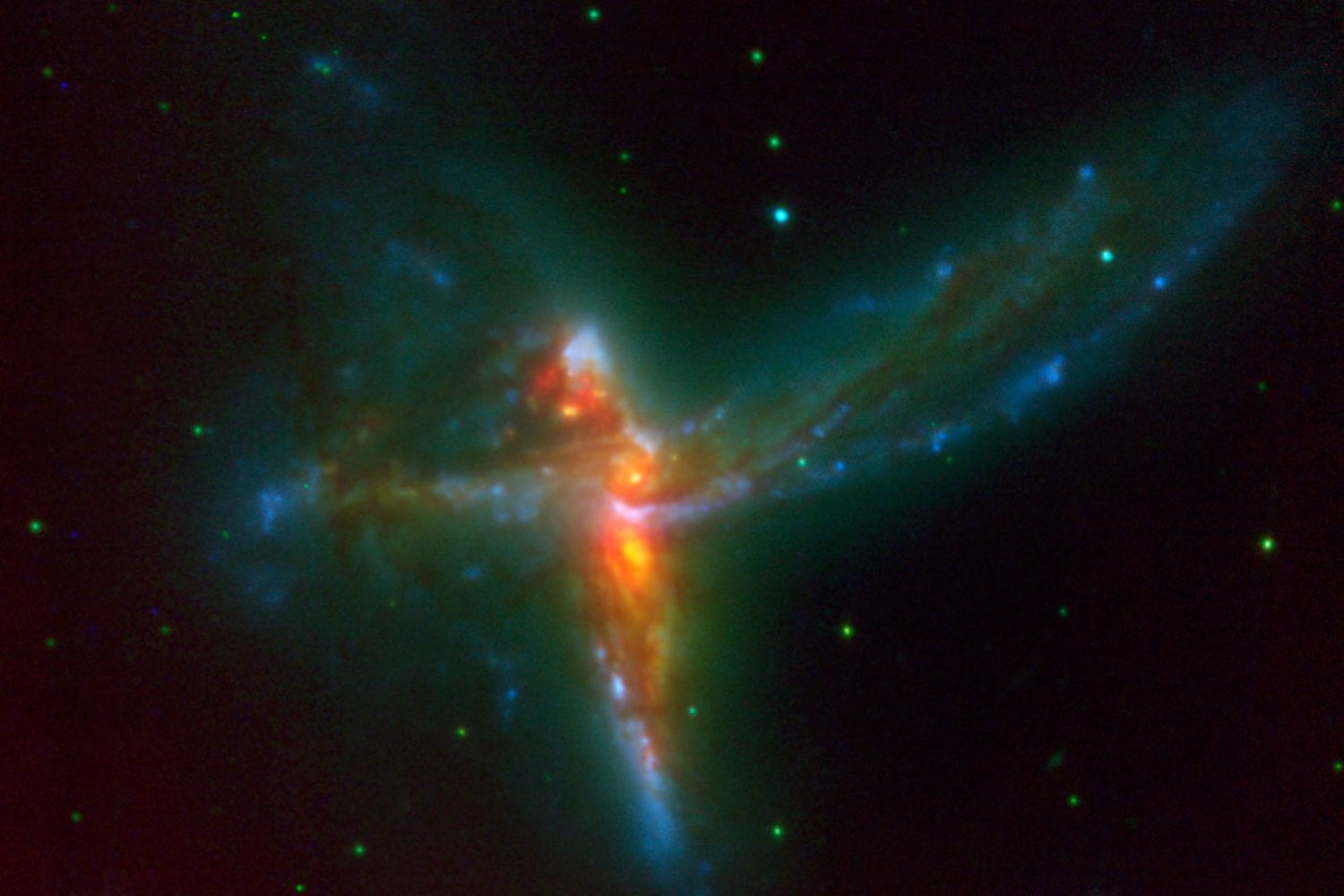 Nunca se había visto algo así en el universo cercano. Tres galaxias están fusionándose al mismo tiempo en una sola danza gravitatoria
