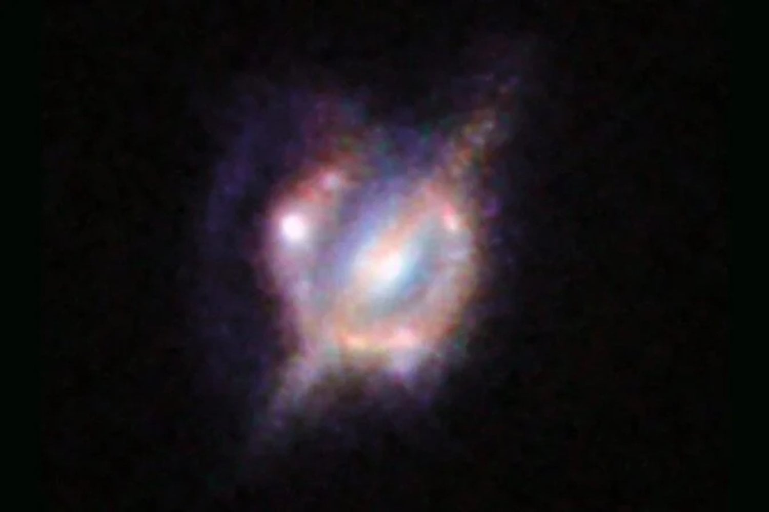 Detectan un láser cósmico a 8.000 millones de años luz. La señal amplificada por una lente gravitacional revela cómo colisionaban galaxias cuando el universo tenía la mitad de su edad