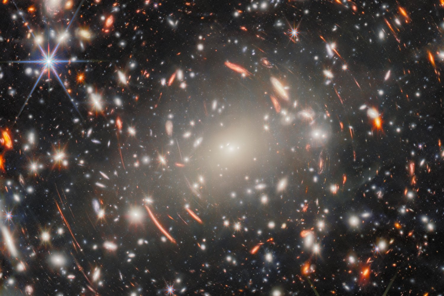 El telescopio James Webb ha encontrado la evidencia más sólida de que algunos “pequeños puntos rojos” esconden agujeros negros envueltos en gas. El hallazgo podría explicar por qué estos objetos parecían demasiado brillantes para existir en el universo primitivo